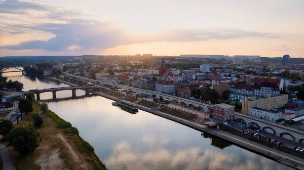 stock image In Gorzw Wielkopolski, a drone photo was taken on a sunny day featuring the River Warta, the Cathedral, and the city center