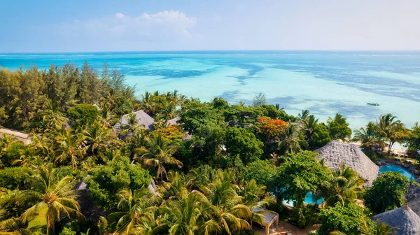 stock image Indulge in the sheer beauty of Zanzibar Beach, with its turquoise waters and pristine white sands that offer a perfect backdrop for romantic getaways and family vacations.