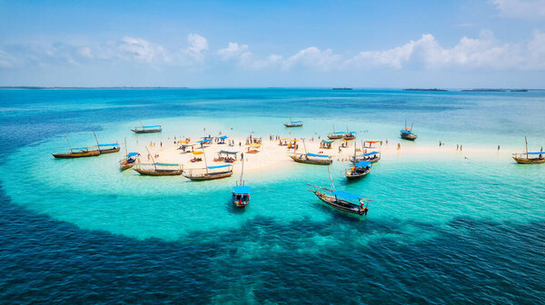 A classic Arabian dhow made of wood and commonly seen near Zanzibar in the Indian Ocean, a traditional boat from Tanzania.