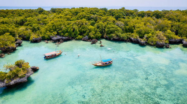 A classic Arabian dhow made of wood and commonly seen near Zanzibar in the Indian Ocean, a traditional boat from Tanzania.
