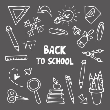 Back to school set with objects and school supplies isolated on dark gray background.