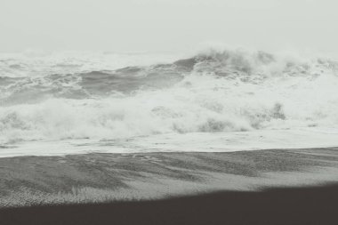 Heavy storm on sea beach monochrome landscape photo. Beautiful nature scenery photography with sky on background. Idyllic scene. High quality picture for wallpaper, travel blog, magazine, article