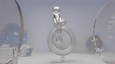 Seamless loop animation of two torus connected like chain links, oddly satisfying, Abstract background, Infinite Loop, motion blur, 3d render