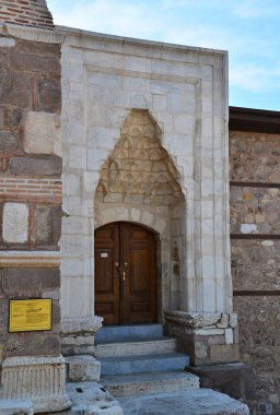 Arslanhane Mosque in Ankara, Turkey, and the tomb next to it are 13th century structures.