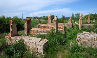 Halime Hatun Vault is a Seljuk mausoleum located in the Gevas district of Turkey. It is located to the east of the Seljuk Cemetery in the district. It was built in 1335 by the Saltuklu chief Meliki Izzettin Saltuk for his daughter Halime Hatun.
