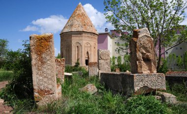 Halime Hatun Vault is a Seljuk mausoleum located in the Gevas district of Turkey. It is located to the east of the Seljuk Cemetery in the district. It was built in 1335 by the Saltuklu chief Meliki Izzettin Saltuk for his daughter Halime Hatun.