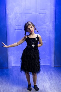 Young girl tiktoker created dancing video by smartphone camera. To share video or photo to social media application. Girl recording trendy dance moves for social media account