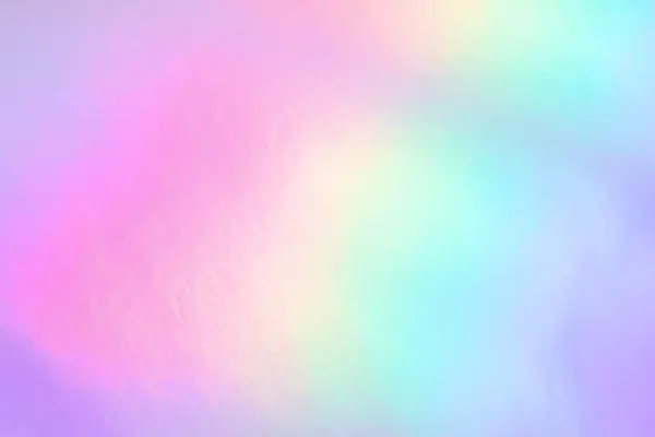 Işıldayan parlak folyo arka plan yumuşak pastel renkler yayıyor..