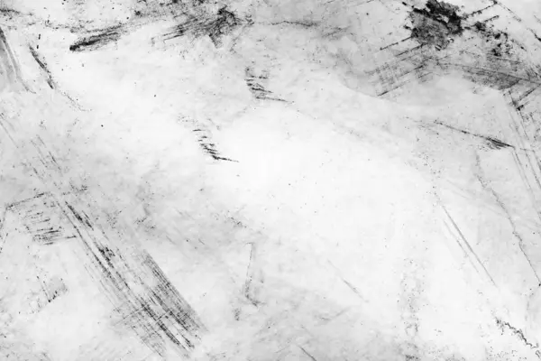 Sert fırça darbeleri ve lekeleri olan siyah beyaz grunge dokusu.