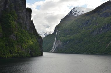 Norwegian Fjord Waterfallseven Sisters nature background skandinavia cruise. High quality photo clipart