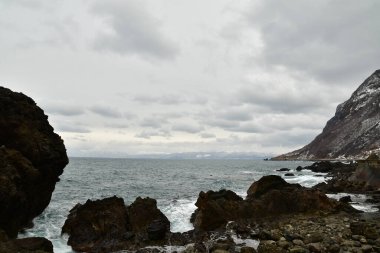 Hokkaido Winter Coast Line near iwainai cloudy rough sea. High quality photo clipart