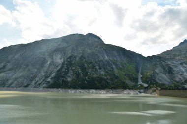 reservoir mountain Grimsel Pass Swiss Beautiful landscape alpine. High quality photo clipart