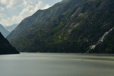 reservoir mountain Grimsel Pass Swiss Beautiful landscape alpine. High quality photo clipart