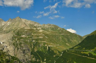 Alpine Road Grimsel Pass swizerland Alps curves europe Furkapass mountain scenery. High quality photo clipart