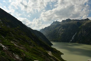 reservoir mountain Grimsel Pass Swiss Beautiful landscape alpine. High quality photo clipart