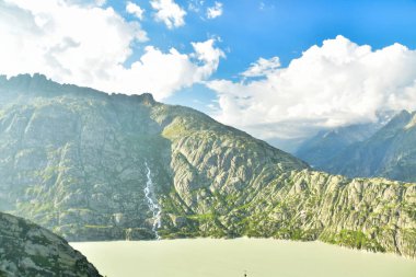 alpine panorama Grimsel Pass Swizerland Bckground Light Summer . High quality photo clipart