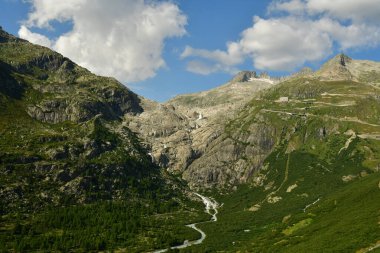 Alpine Road Grimsel Pass swizerland Alps curves europe Furkapass mountain scenery. High quality photo clipart