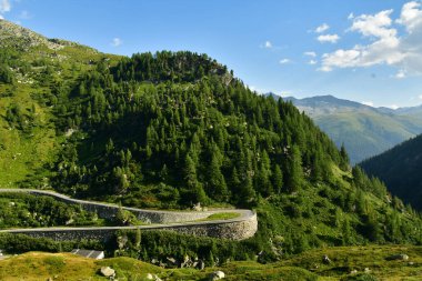 Alpine Road Grimsel Pass swizerland Alps curves europe Furkapass mountain scenery. High quality photo clipart