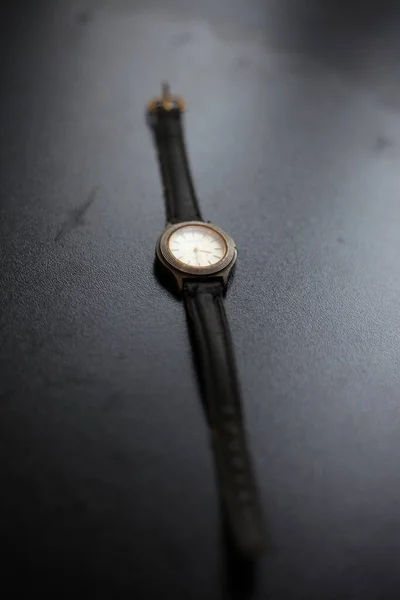 old black wrist watch