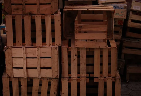 Empty wooden crates stacked on top of each other
