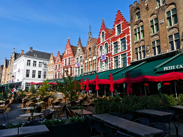 Bruges, April 2023: Magnificents facades of the buildings of Bruges, the Venice of the North
