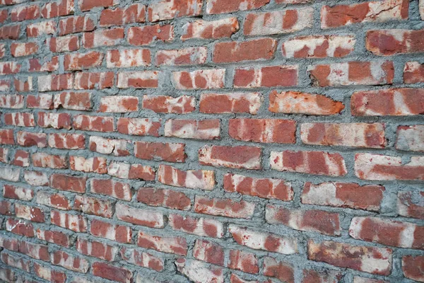 Brick Wall Arkaplanı. Eski, eski bir tuğla duvarın arka planı. Geniş açılı, eski, kırmızı tuğlalı bir arka plan. Geniş açılı Vintage Kırmızı Tuğla Arkaplan.