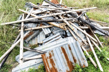 Old house steel materials with bamboo scrap ready for recycling. Full frame, background and texture.