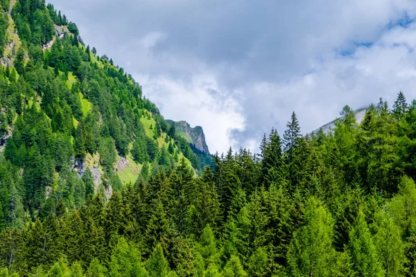 stock image dolomite mountains in alps with clouds and fog in landscape scenery