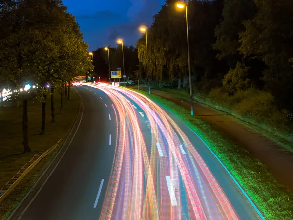 stock image light trails left from traffic on motorway during night