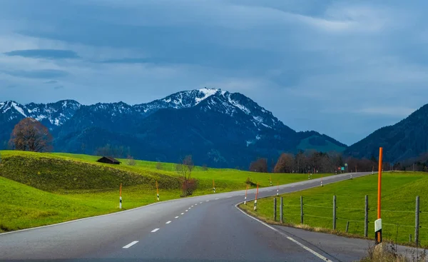 Stock image Austrian alps, Green meadows, alpine cottages and mountains