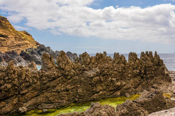 stock image Natural pools with black volcanic rock in the Atlantic Ocean Porto Moniz, Madeira, Portugal