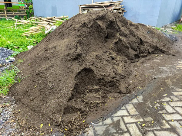 A pile of sand for concrete cement mix or mortar mold for construction. No people