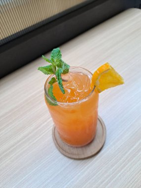 Glass of detox juice, mixed of orange and carrot, homemade, fresh and healthy