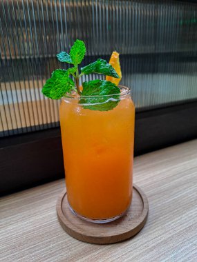 Glass of detox juice, mixed of orange and carrot, homemade, fresh and healthy