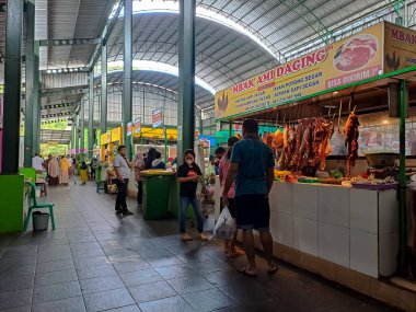 Activity of people buying daily needs in the traditional market. Malang Indonesia, February 11, 2023