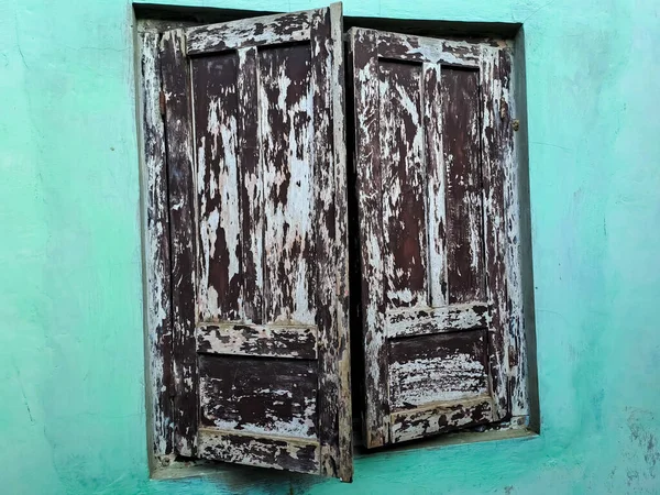 stock image Old window in blue wall, traditional javanese style