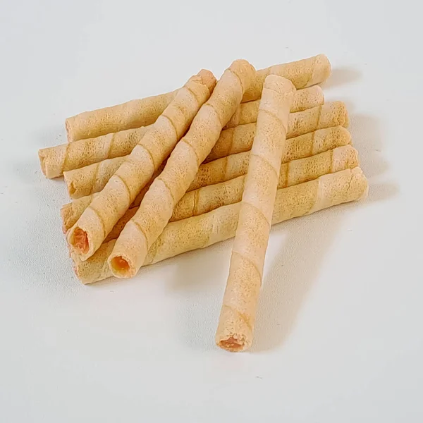 Cheese wafer rolls isolated on white background