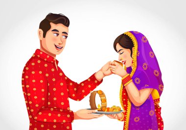 Karwa Chauth 'u kutlayan mutlu Hintli çift. Karwa Chauth geleneğini icra eden koca oruç tutan karısına su sunuyor.