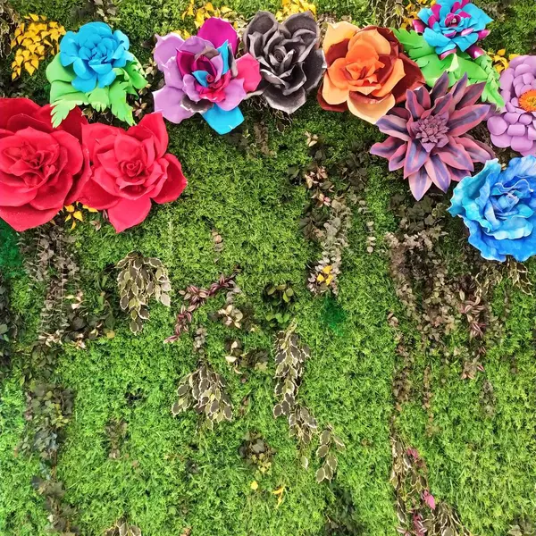 colorful flower arrangement on a background of grass