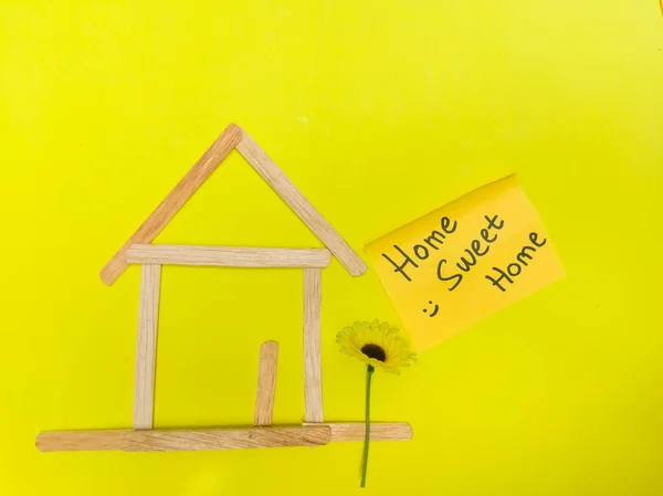 Home Sweet Home illustration. Illustration of a house. Home sweet home with sunflower closeup view.