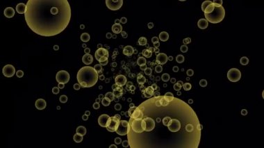 Siyah arka planda uçuşan renkli kabarcıklar