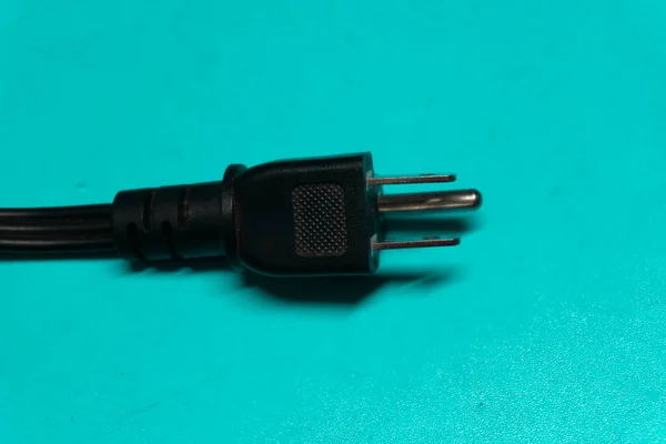 Cable with 3 pin plug.   Electric cable plug.