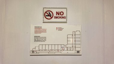Tahliye Planı ve Duvar Güvenliğinde Sigara İçilmez İşareti