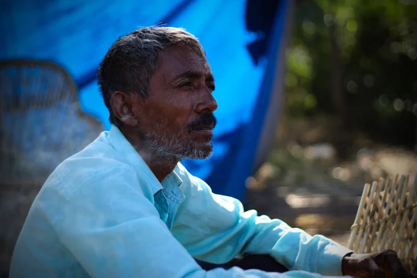 stock image Vadodara, Gujarat - November 19th 2022: Aged Indian man close up face with wrinkled skin and grey hair good and beautiful face smoking