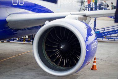 Indian aircraft landed in a busy airport terminal engine wings close view international domestic