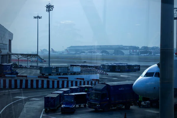 Indian aircraft landed in a busy airport terminal engine wings close view international domestic