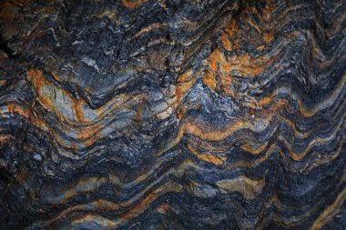 Kayalardaki su erozyonu, dokular ve desenler Asturian plajlarındaki taşlarda oluşmuş. Kuzey İspanya, Asturias 'taki Campiecho plajı..