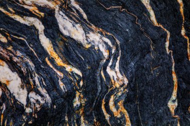 Kayalardaki su erozyonu, dokular ve desenler Asturian plajlarındaki taşlarda oluşmuş. Kuzey İspanya, Asturias 'taki Campiecho plajı..