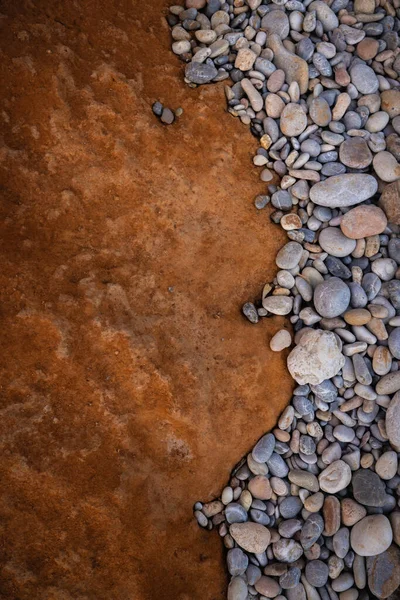 The erosion of water on the rocks, textures and patterns generated on the stones of the beach Ibiza island.