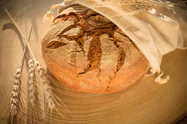 fresh rye bread on wooden background (version 2)